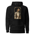 Black hoodie featuring an exclusive distressed ink portrait of J Cole. The design depicts the artist as a medieval knight wearing detailed plate armor. The artwork is encased in a weathered stone arched frame inspired by medieval chronicles