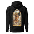 Black hoodie featuring an exclusive distressed ink portrait of xxxtentacion. The design depicts the artist as a medieval king wearing a regal crown, nose ring, and heavy gold chains over white royal robes. The artwork is encased in a vibrant gothic arched frame inspired by medieval cathedral windows and 14th-century illuminated manuscripts.